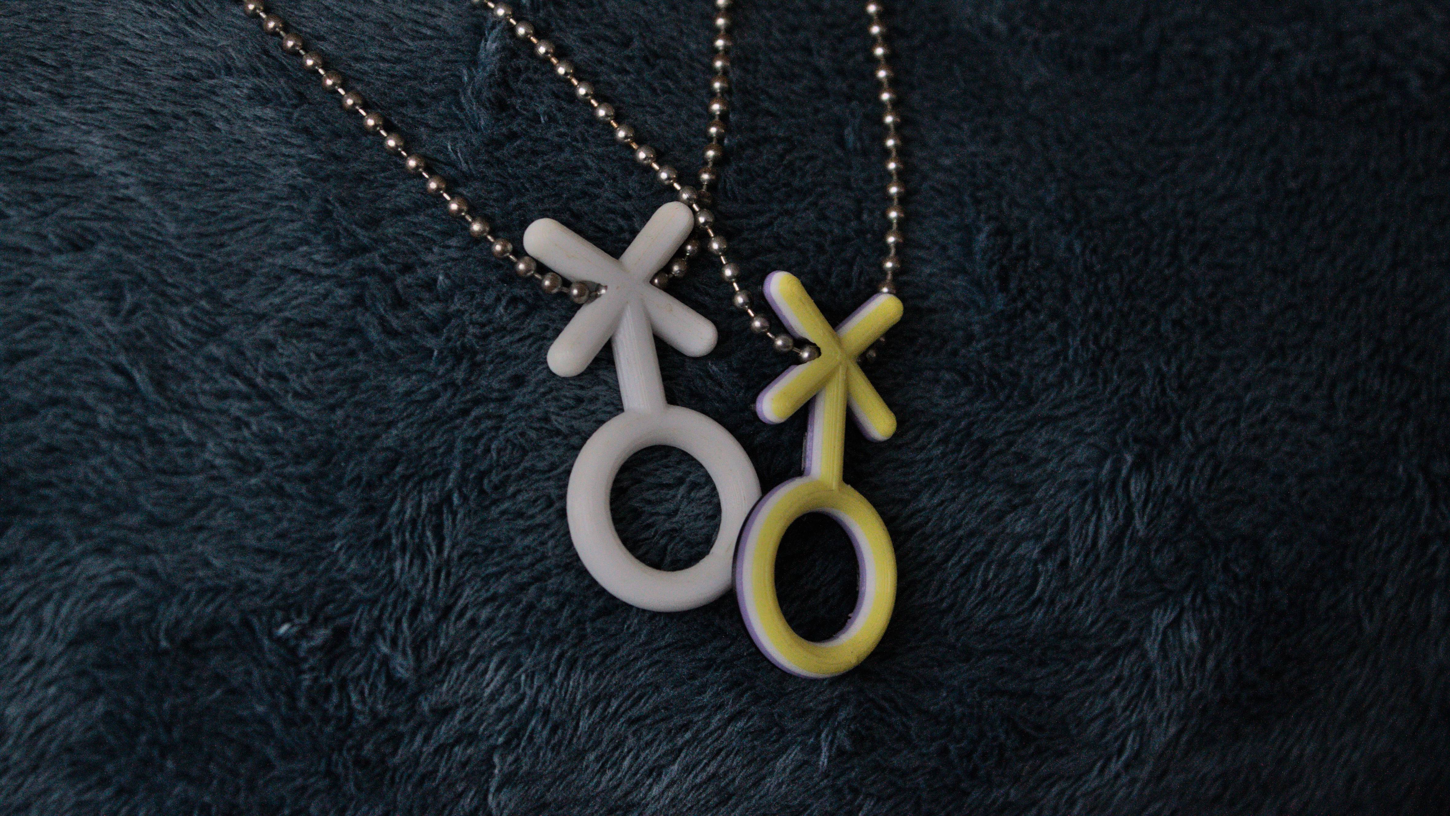 Two necklaces in enby-symbol shape